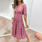 💃 Kleid mit tiefem V-Ausschnitt und Tupfen